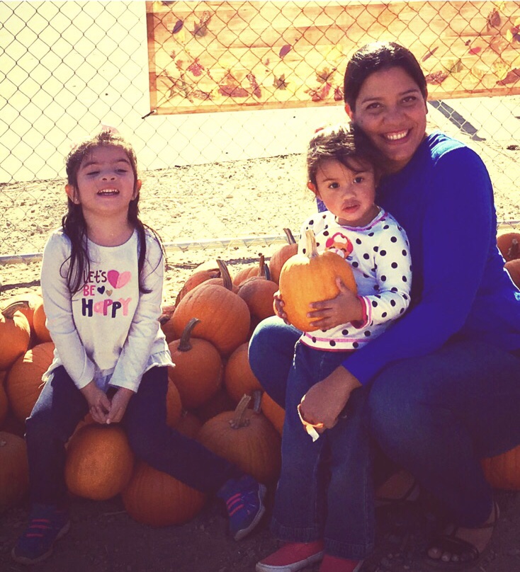 Me and the girls at a pumpkin patch.