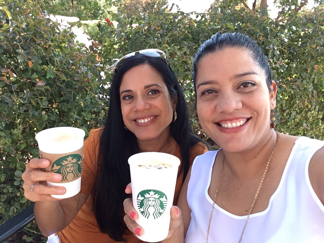 Me and my sister Lourdes enjoying coffee outdoors.